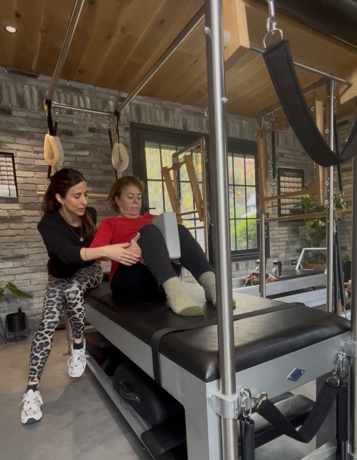 Sesión de pilates clásico en reformer